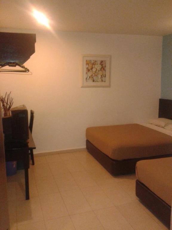 Hotel Ria Johor Bahru Habitación foto